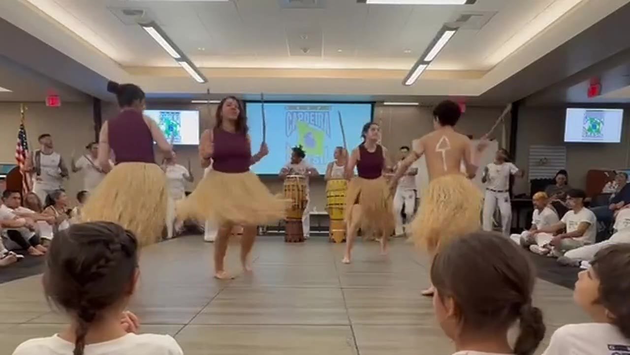 Kids' presentation — grass skirts, the whole school watching
