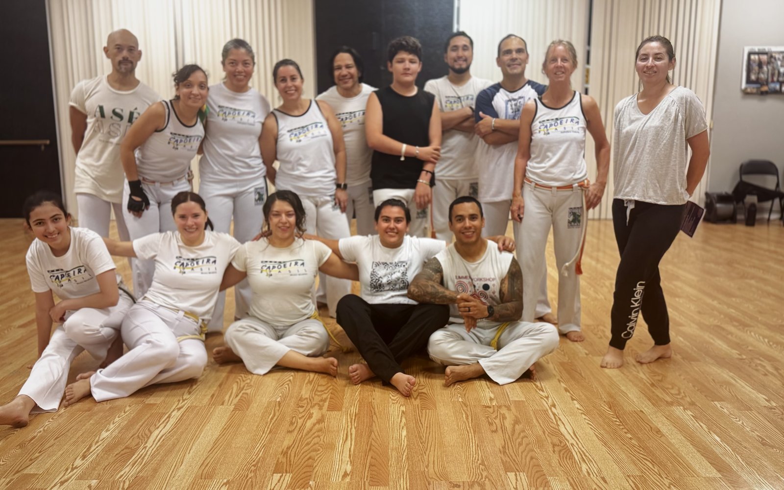 CBPS class in white uniforms, group photo on the studio floor, Palm Springs